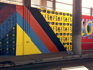 Photo of final mural artwork painted under the I-70 viaduct during the 'duct-work Event (October 6, 2016).